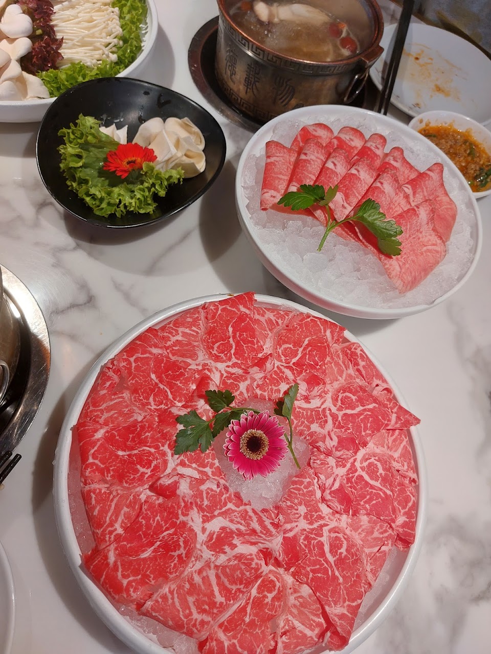 Round meat platter with hot pot sides